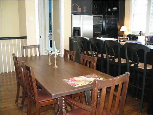 75 East Long Green Road Rosemary Beach, FL 32461 - Photo 4 of 12 a dining room with furniture window and wooden floor