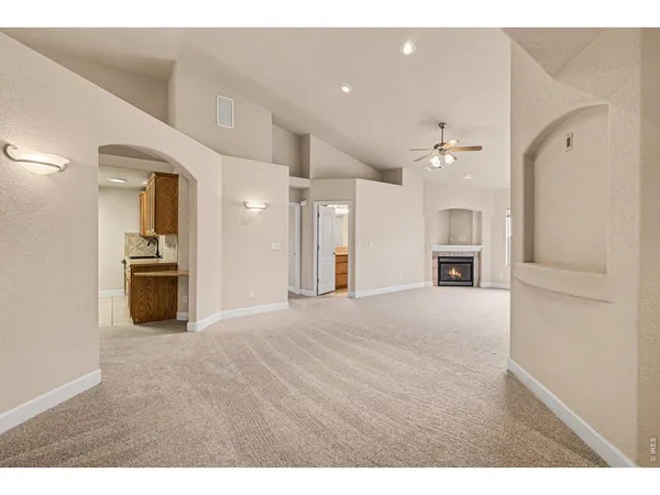 a view of a kitchen with a sink and a kitchen