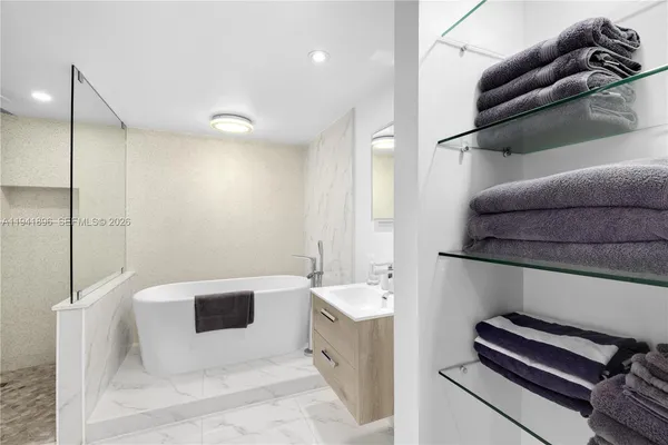 a bathroom with a sink toilet and vanity