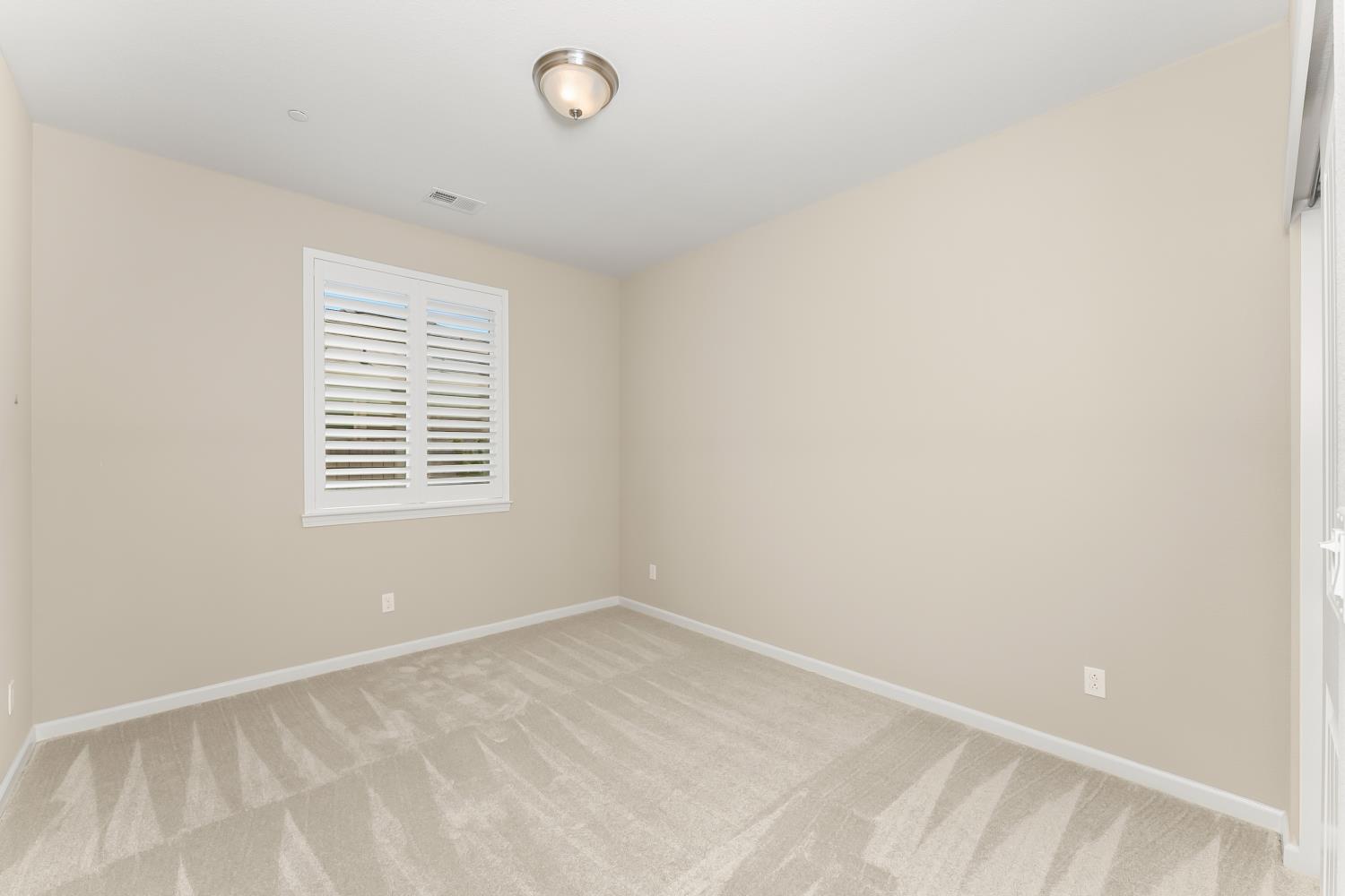 5453 Mossy Stone Way Rancho Cordova, CA 95742 - Photo 14 of 81 an empty room with a window