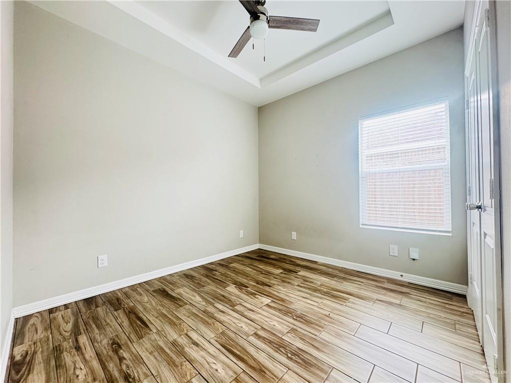 812 Kentucky Street, Unit 1 Mission, TX 78573 - Photo 15 of 18 a view of room with window and ceiling fan