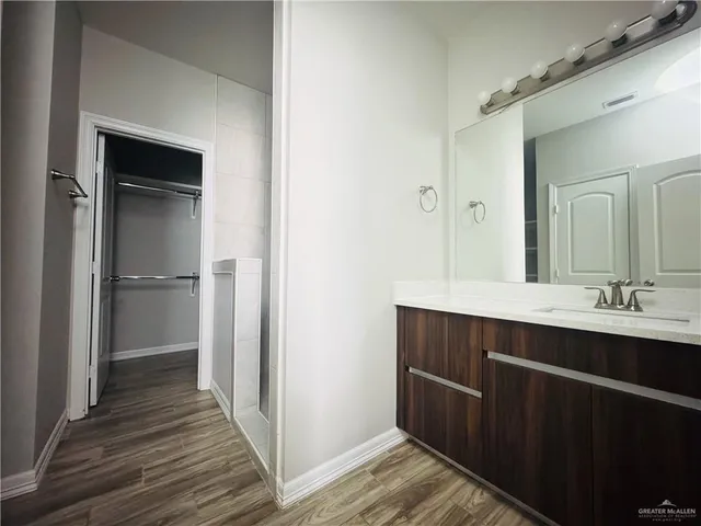 a view of a bathroom from the hallway