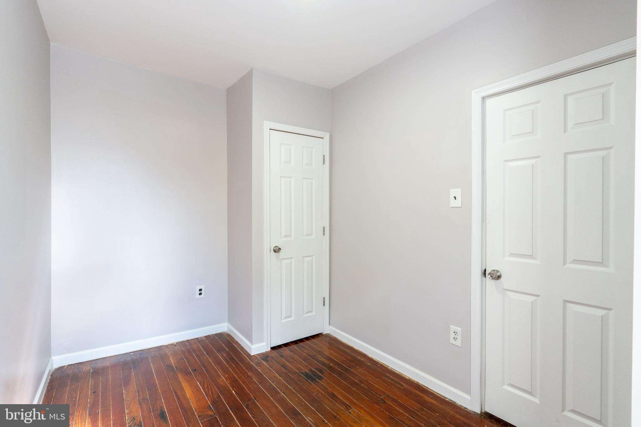1826 McClellan Street Philadelphia, PA 19145 - Photo 13 of 22 a view of an empty room with wooden floor