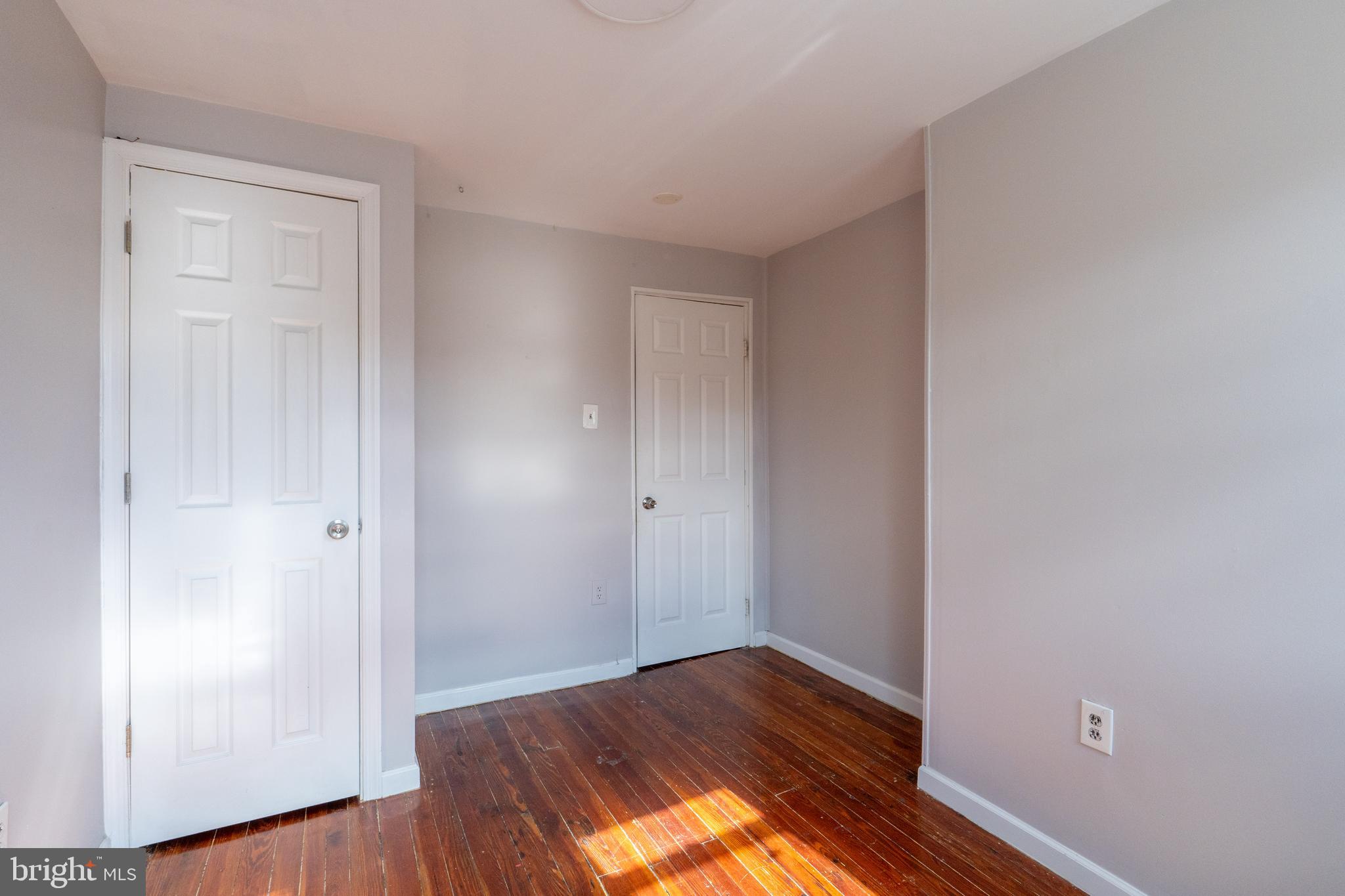 1826 McClellan Street Philadelphia, PA 19145 - Photo 17 of 22 a view of a room with wooden floor and closet