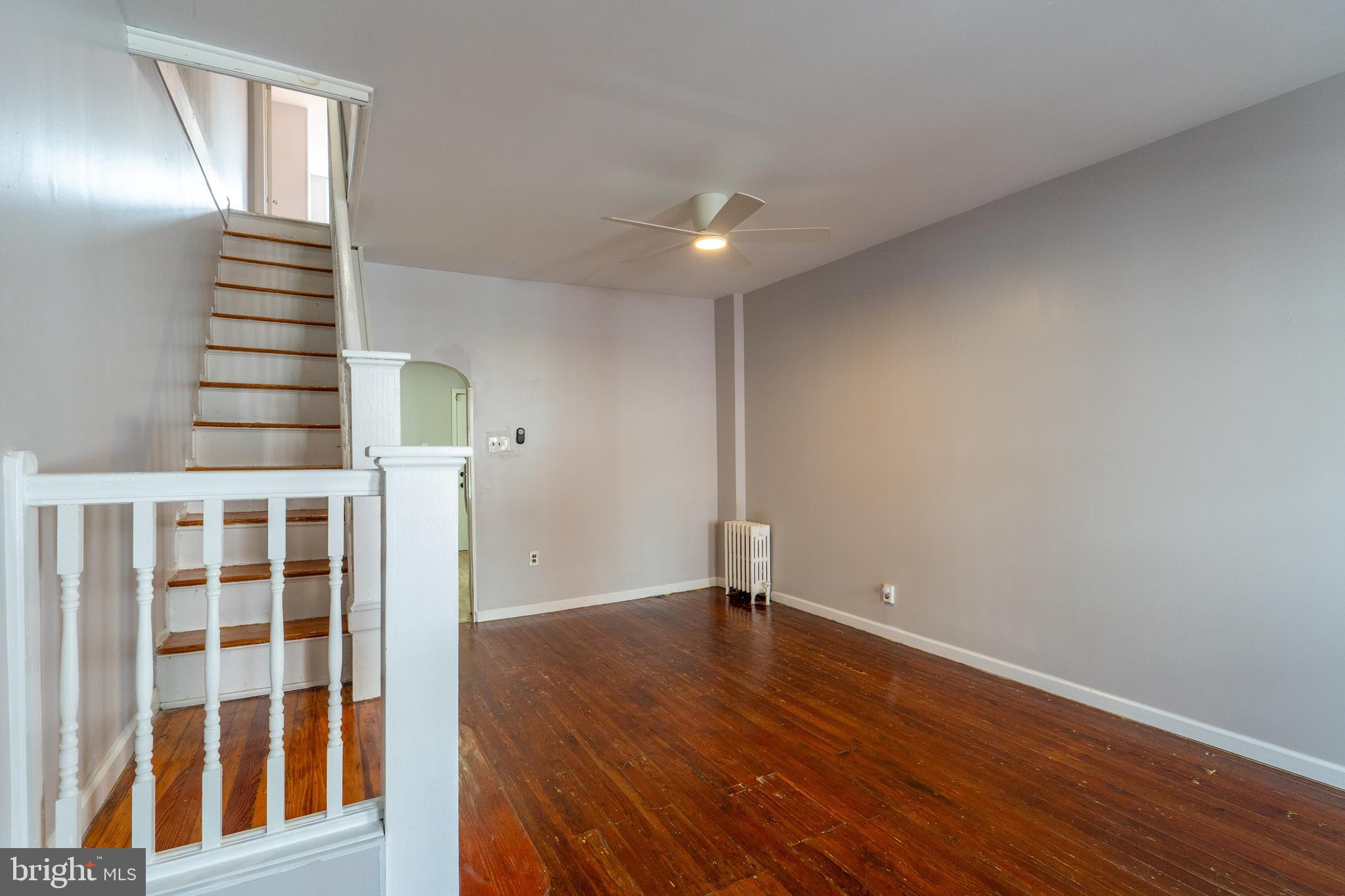 1826 McClellan Street Philadelphia, PA 19145 - Photo 2 of 22 a view of wooden floor and windows in a room