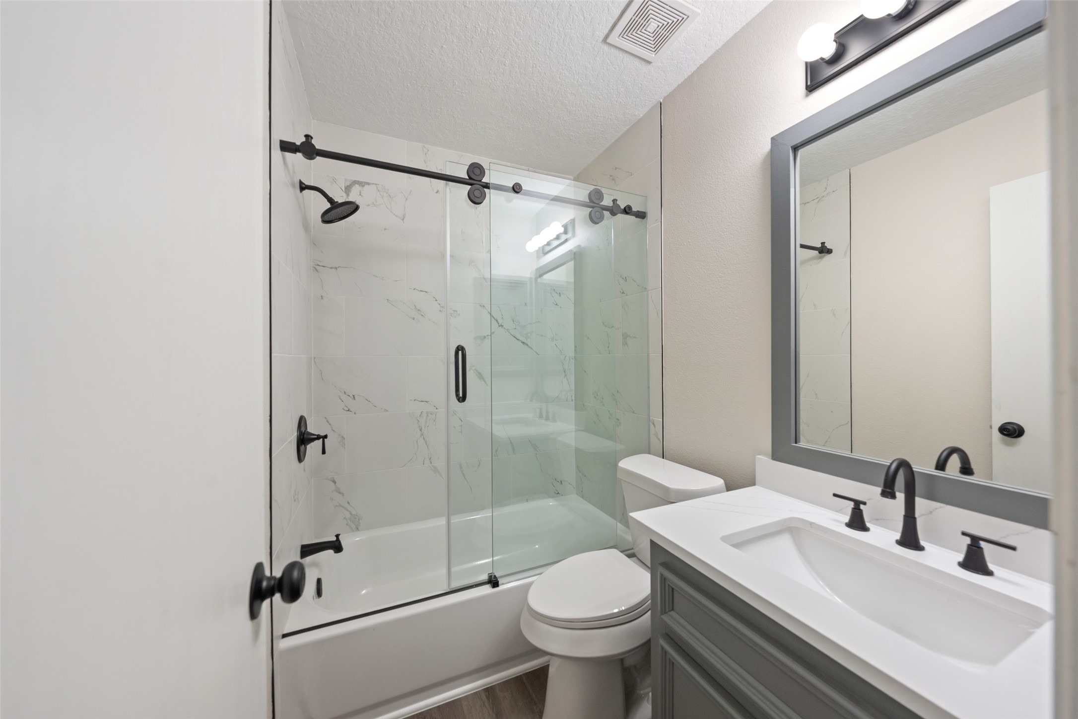 14989 Old Humble Pipeline Road Conroe, TX 77302 - Photo 24 of 33 Second full bath downstairs.