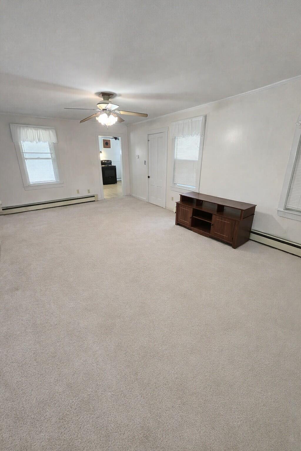 28 Sebago Road Hiram, ME 04041 - Photo 4 of 17 Large, Carpeted Living Room