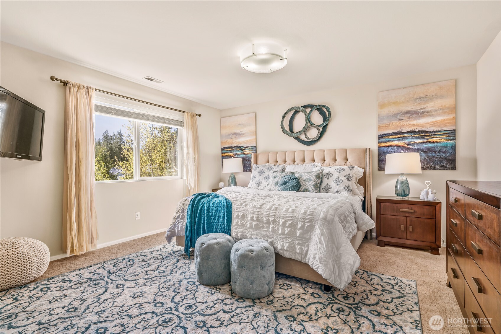 17712 39th Drive Southeast Bothell, WA 98012 - Photo 18 of 40 a bedroom with a large bed and a window