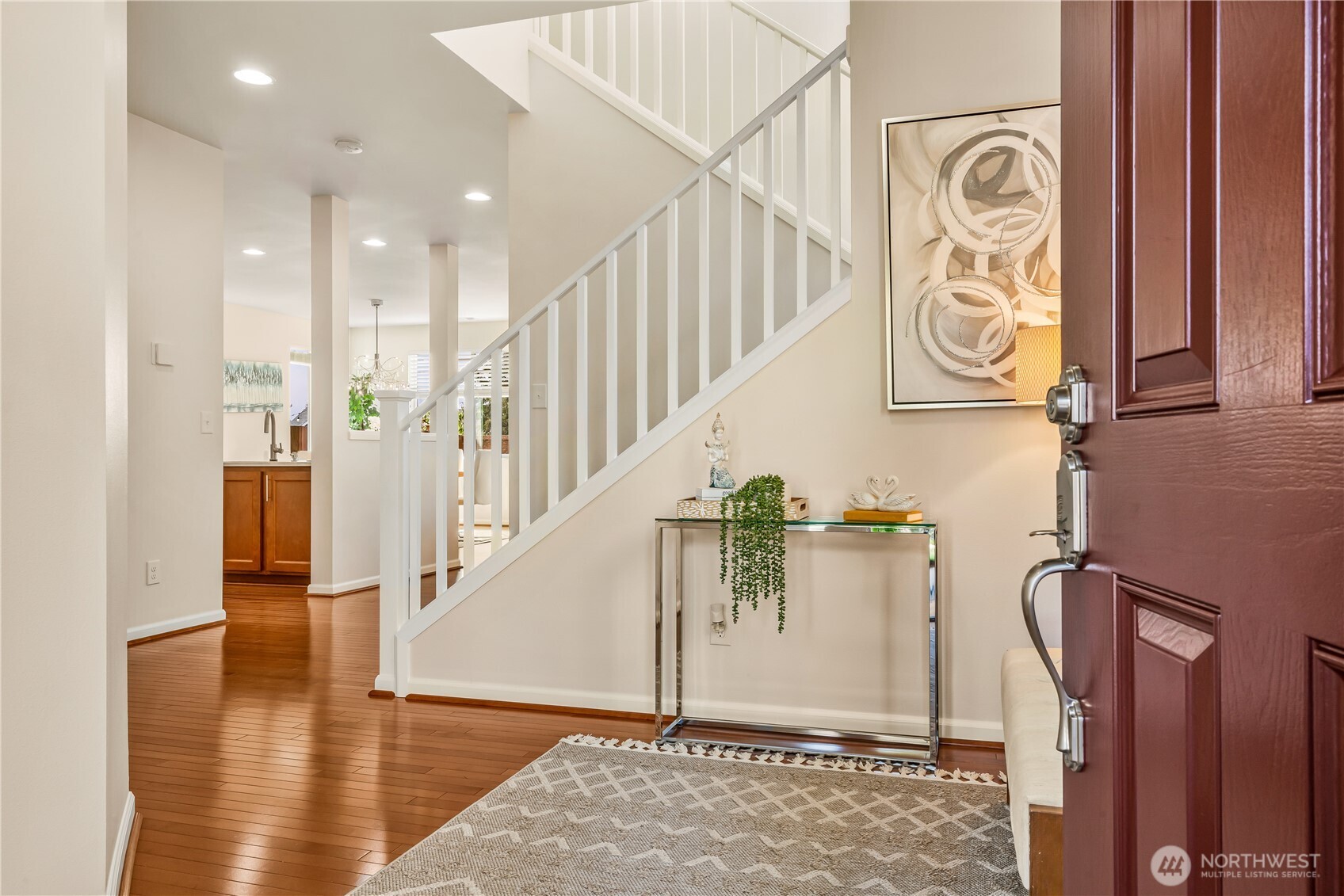 17712 39th Drive Southeast Bothell, WA 98012 - Photo 3 of 40 a view of entryway and hall with wooden floor