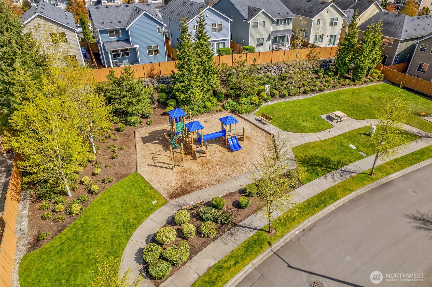 17712 39th Drive Southeast Bothell, WA 98012 - Photo 38 of 40 an aerial view of a house with swimming pool and large trees