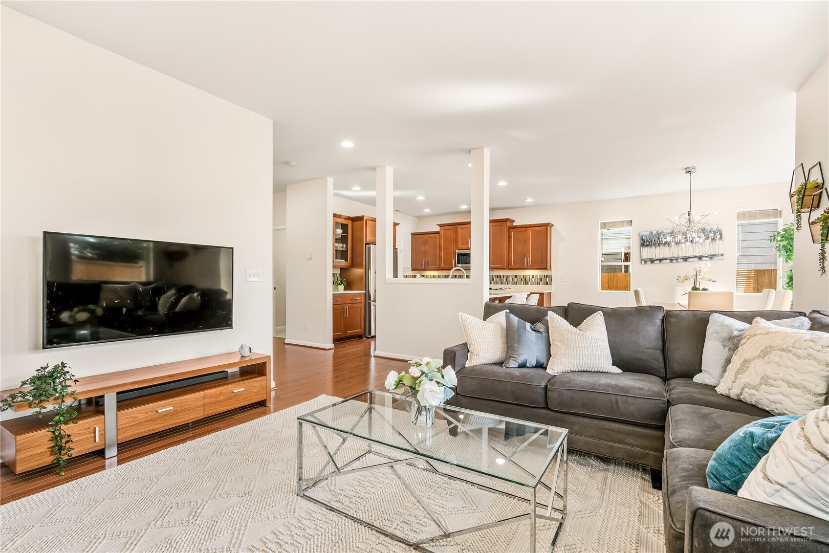 17712 39th Drive Southeast Bothell, WA 98012 - Photo 9 of 40 a living room with furniture and a flat screen tv