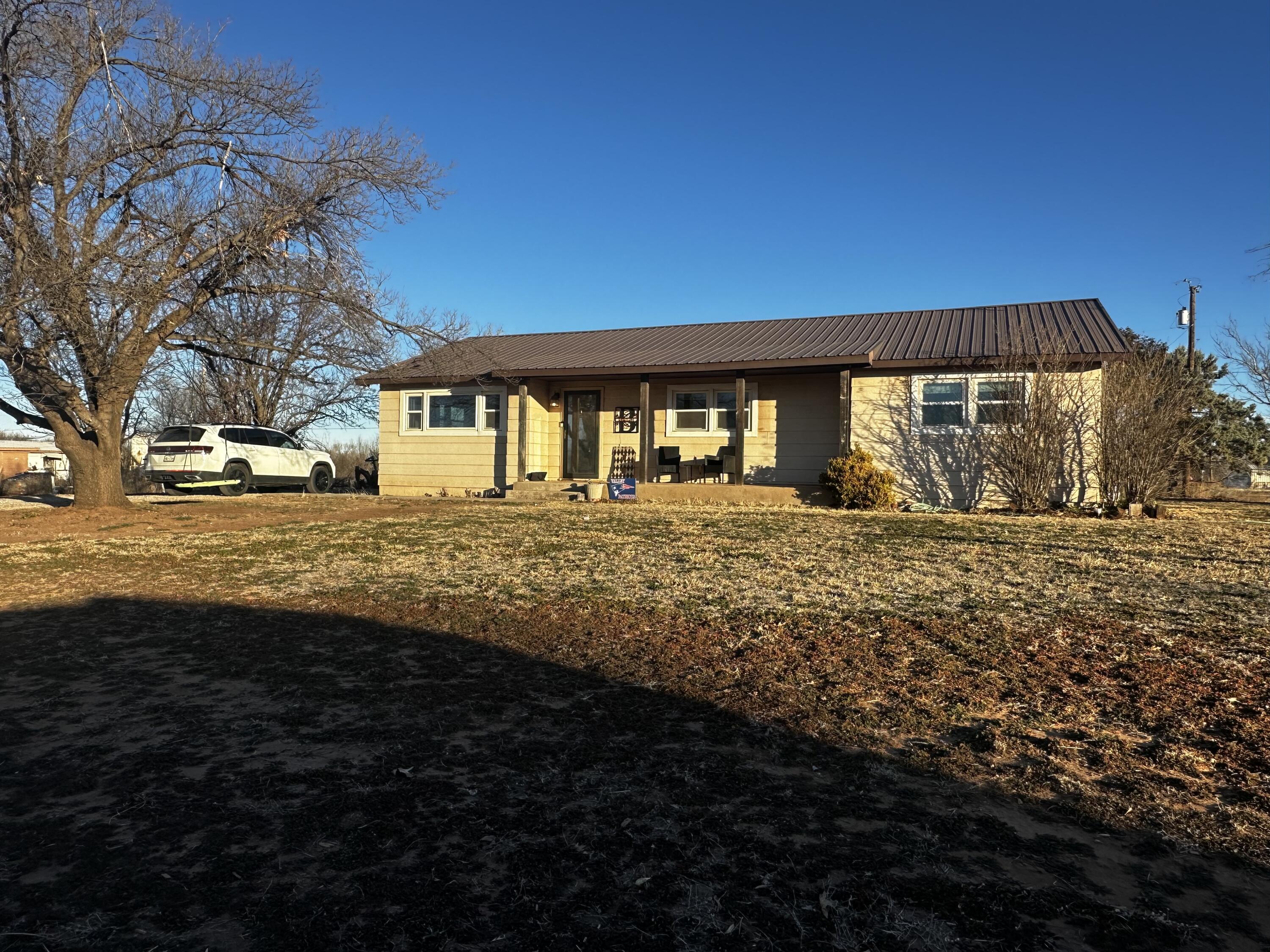 a front view of house with yard