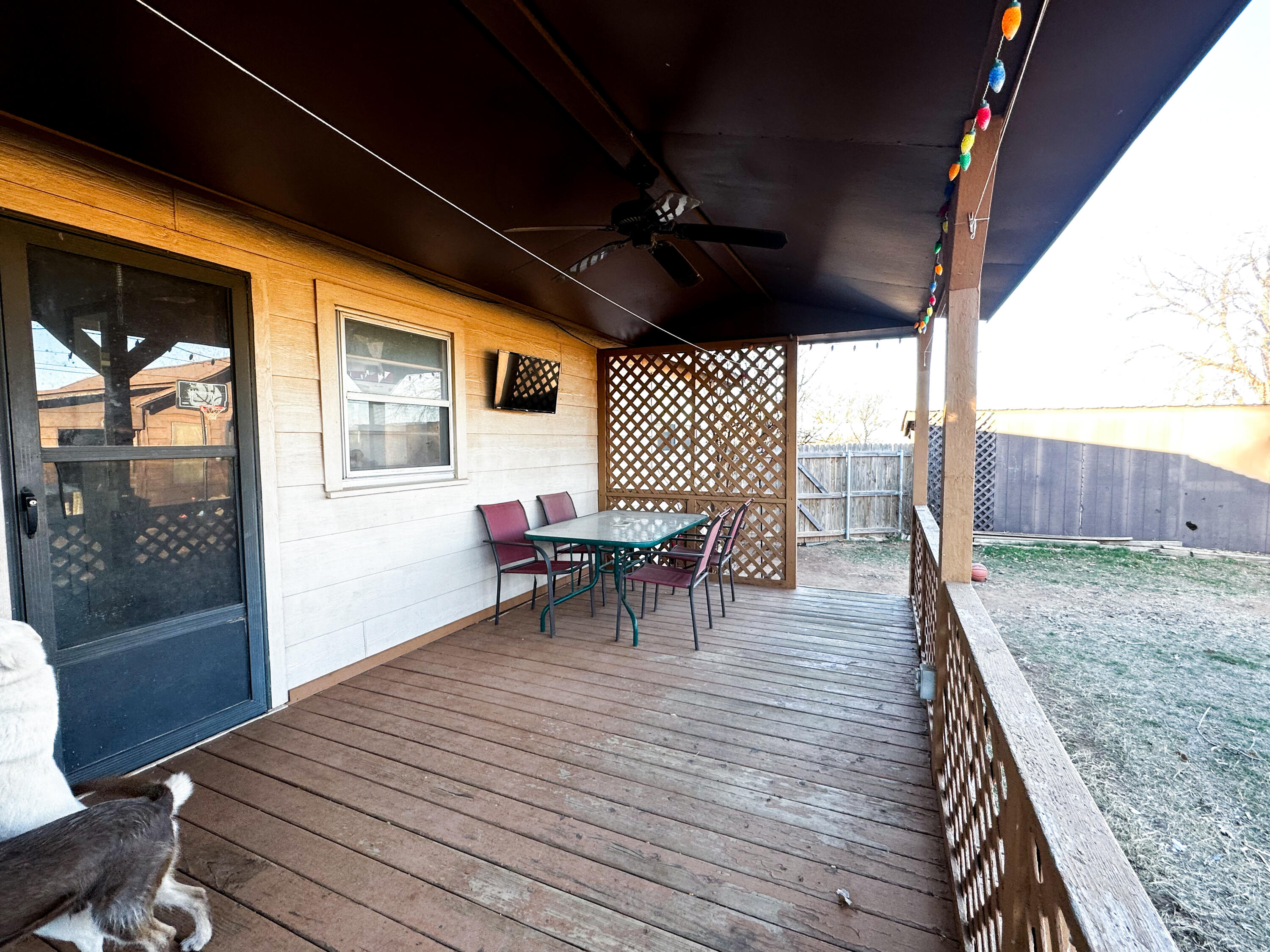 511 Childress Avenue Turkey, TX 79261 - Photo 15 of 20 a view of a patio with wooden floor