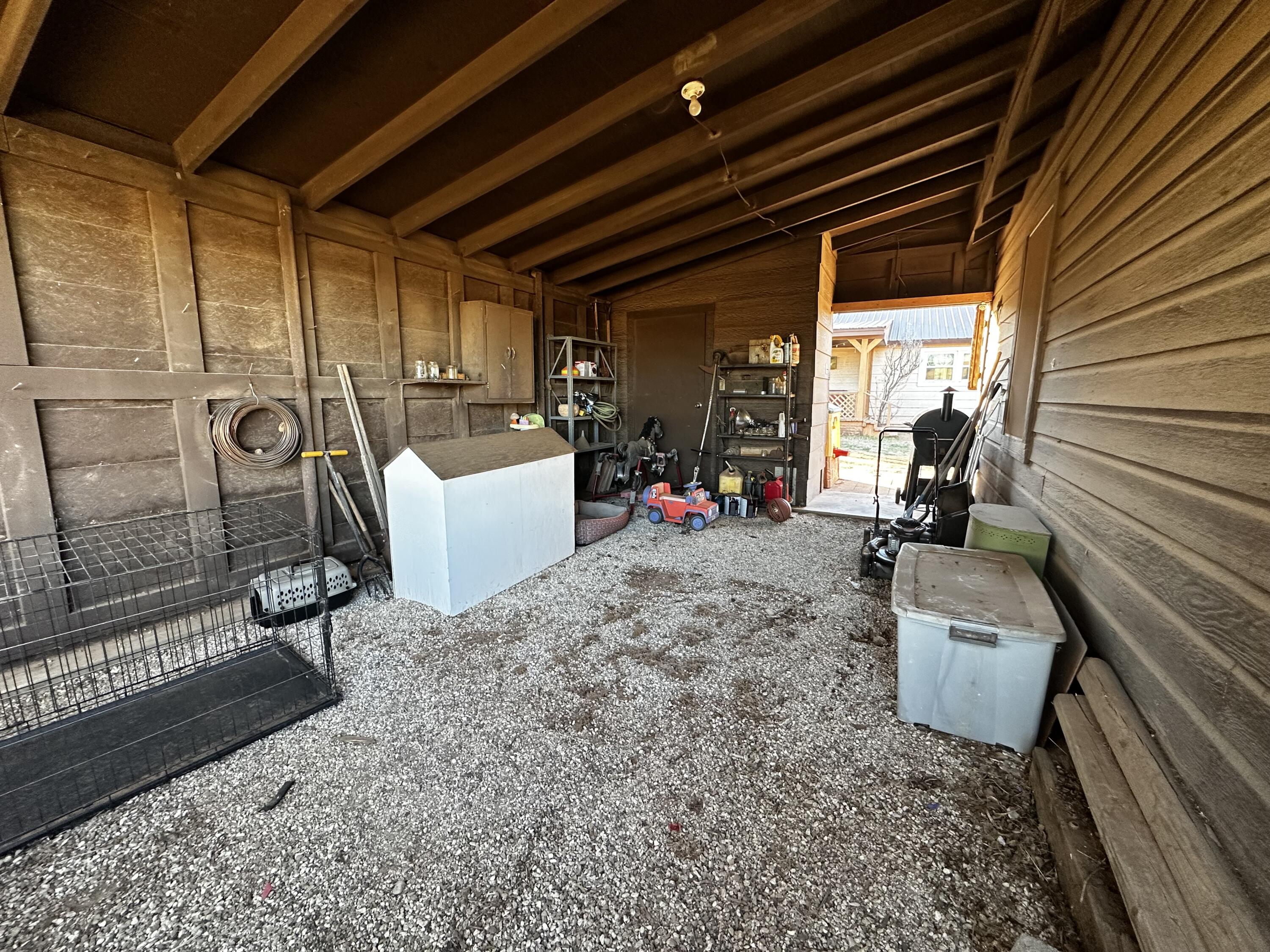511 Childress Avenue Turkey, TX 79261 - Photo 16 of 20 a view of a backyard with a patio