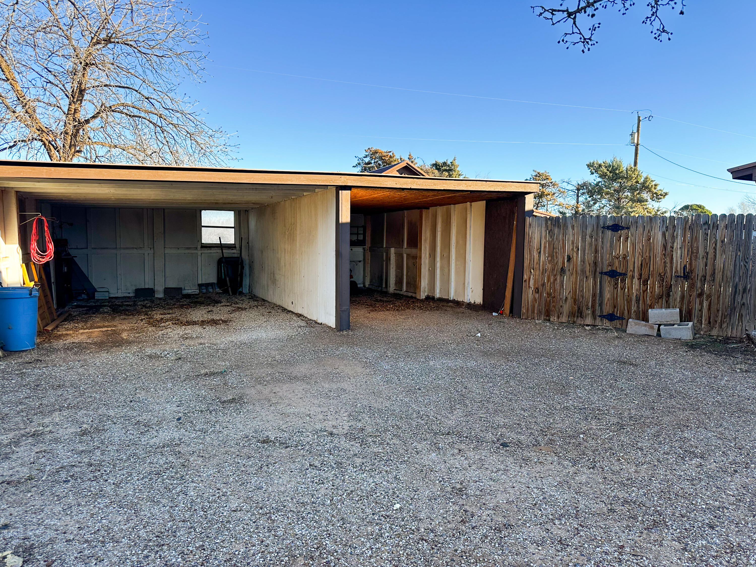 511 Childress Avenue Turkey, TX 79261 - Photo 18 of 20 a view of a house with a garage
