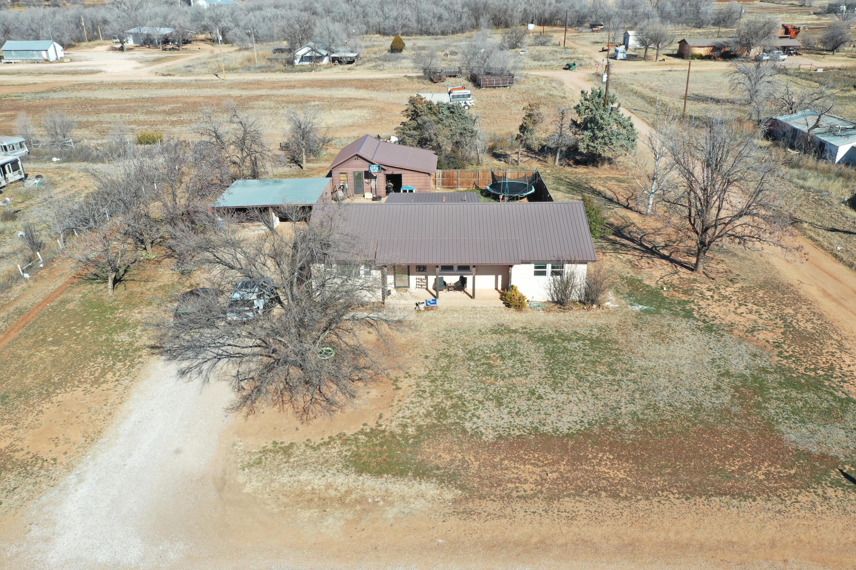 511 Childress Avenue Turkey, TX 79261 - Photo 19 of 20 an aerial view of residential houses with outdoor space