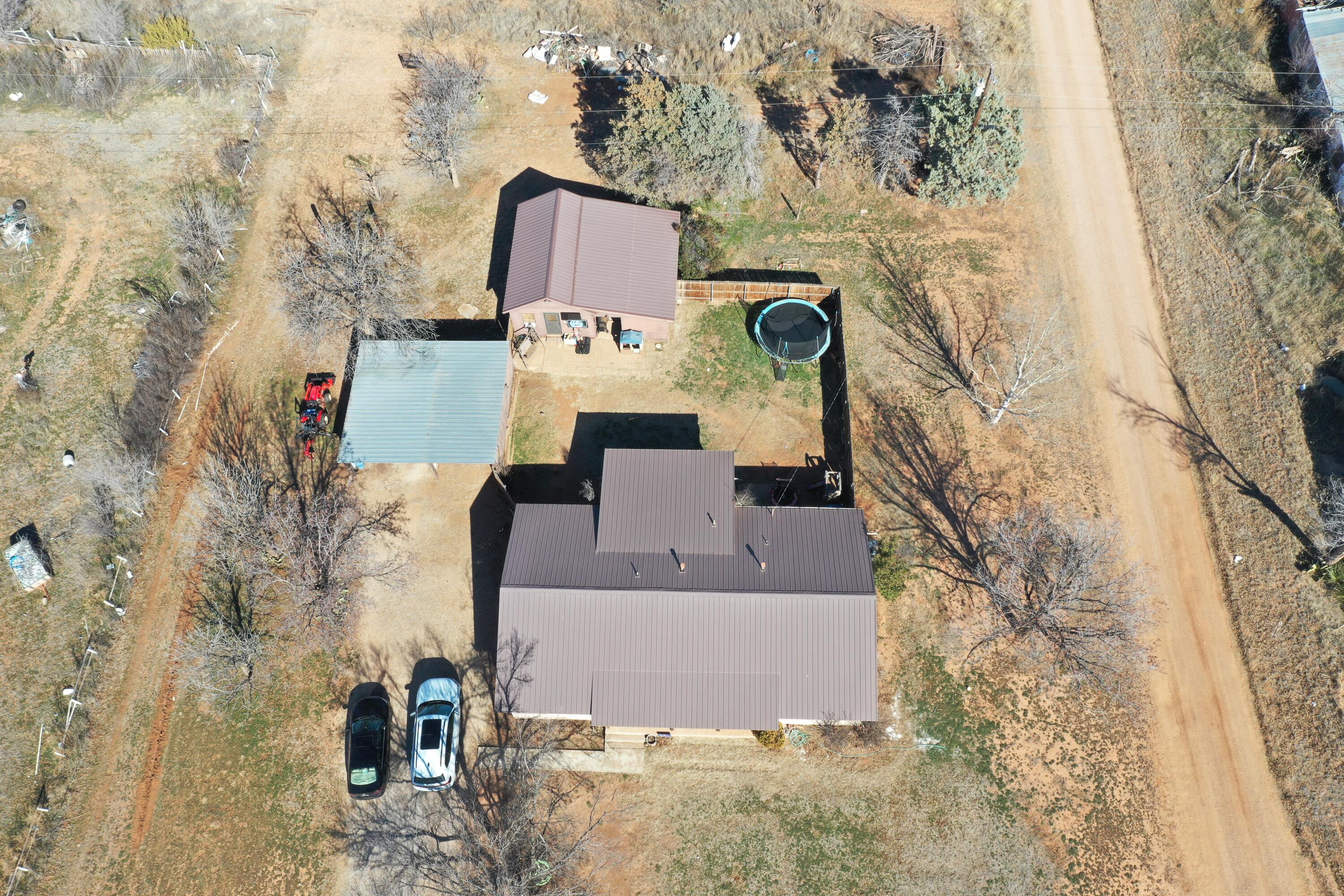 511 Childress Avenue Turkey, TX 79261 - Photo 20 of 20 an aerial view of residential house with outdoor space and parking