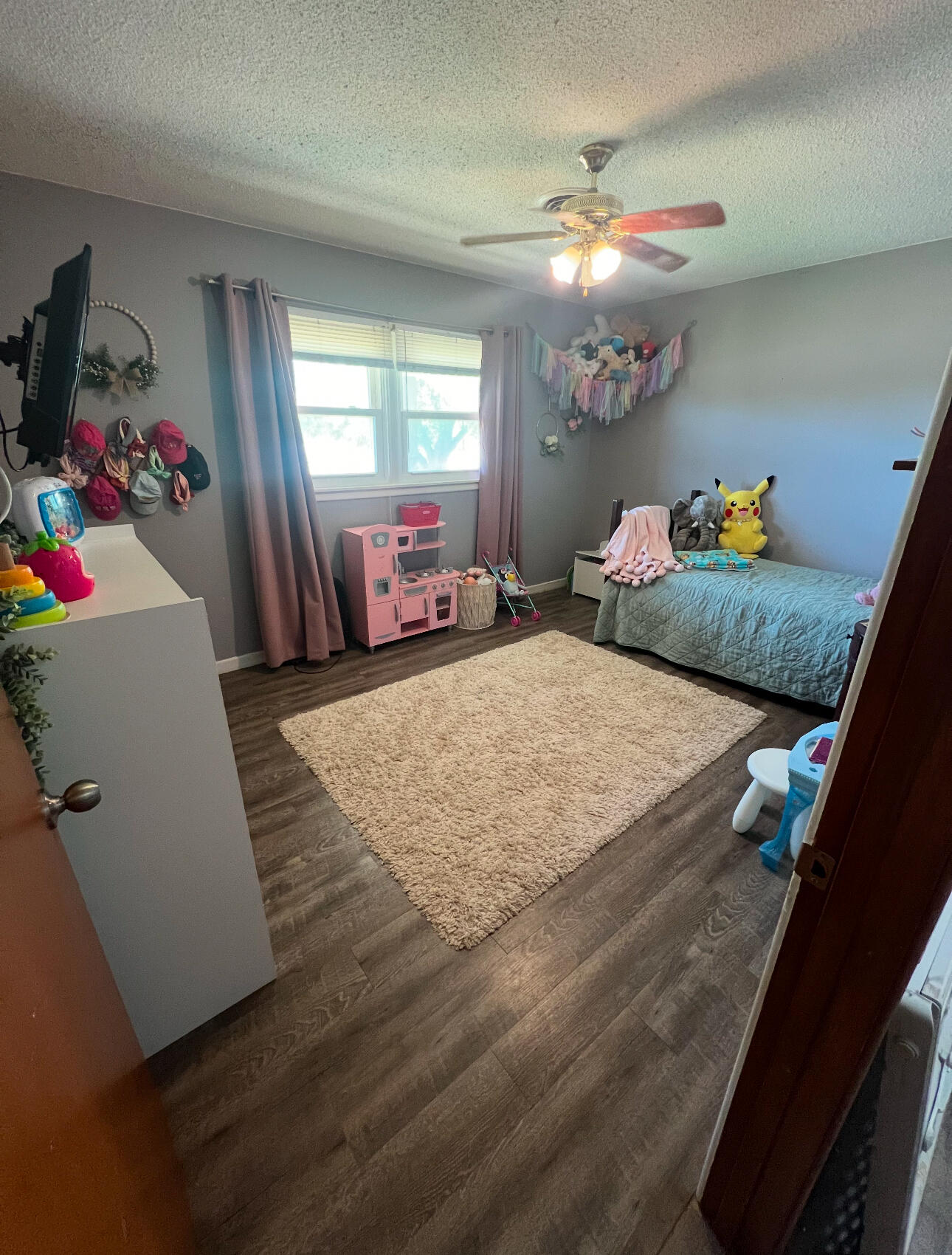 511 Childress Avenue Turkey, TX 79261 - Photo 9 of 20 a bedroom with a bed and window