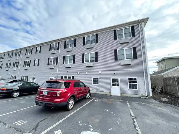 a car parked in front of a building