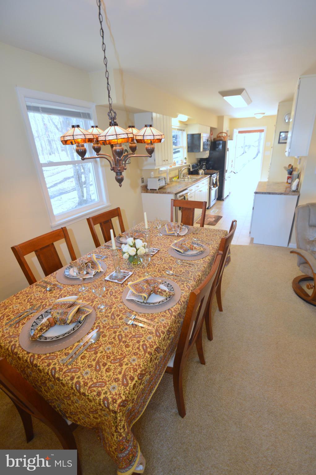 671 Razorback Ridge Road Great Cacapon, WV 25422 - Photo 14 of 35 Dining area and kitchen.