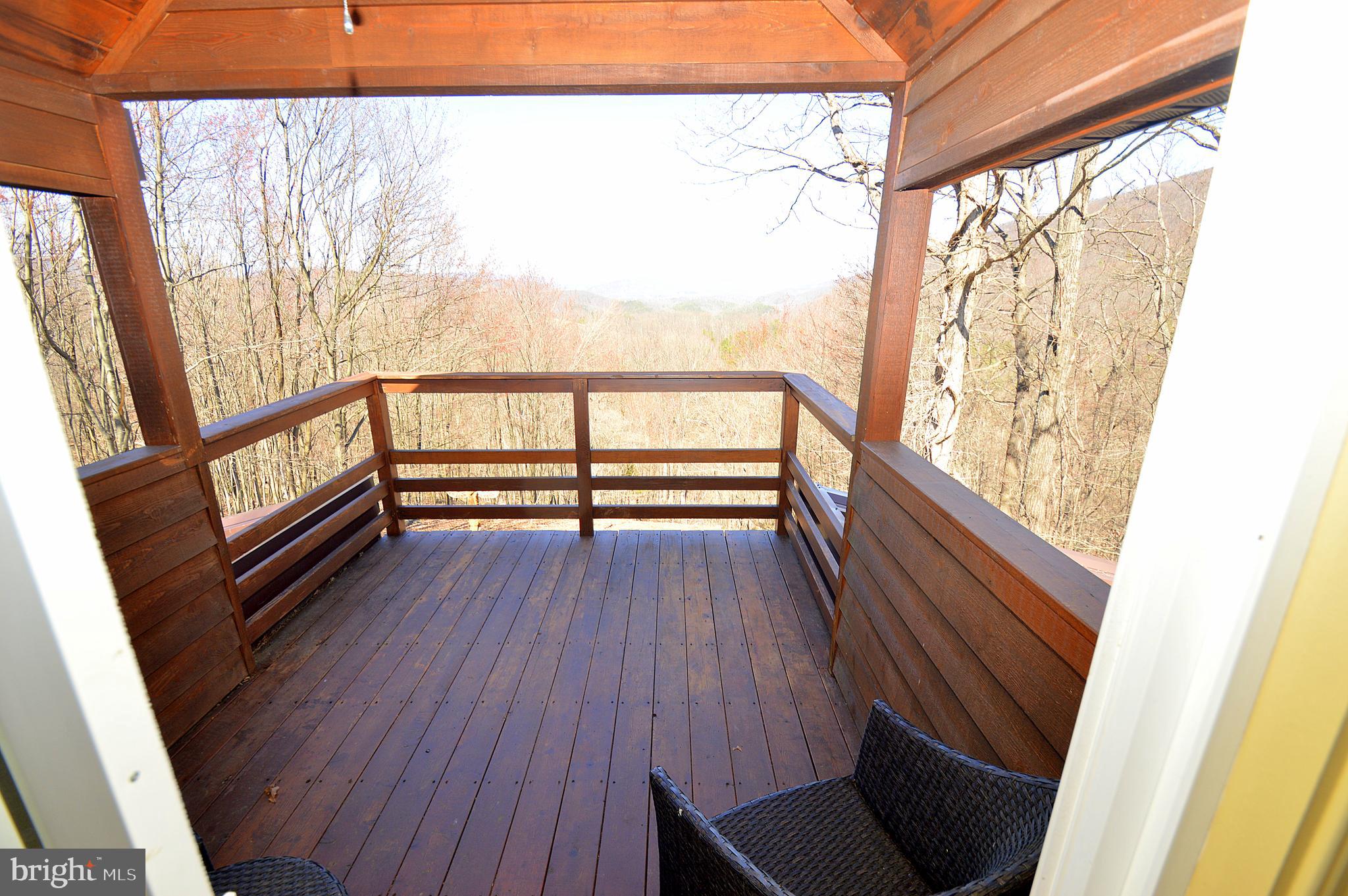 671 Razorback Ridge Road Great Cacapon, WV 25422 - Photo 21 of 35 Upstairs deck.
