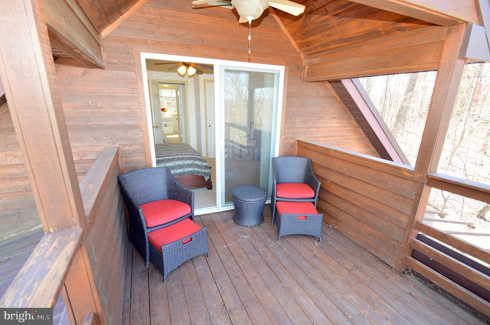 671 Razorback Ridge Road Great Cacapon, WV 25422 - Photo 22 of 35 Upstairs deck.