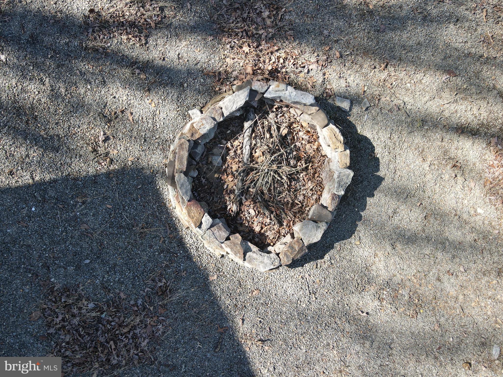 671 Razorback Ridge Road Great Cacapon, WV 25422 - Photo 32 of 35 Outdoor fire pit.