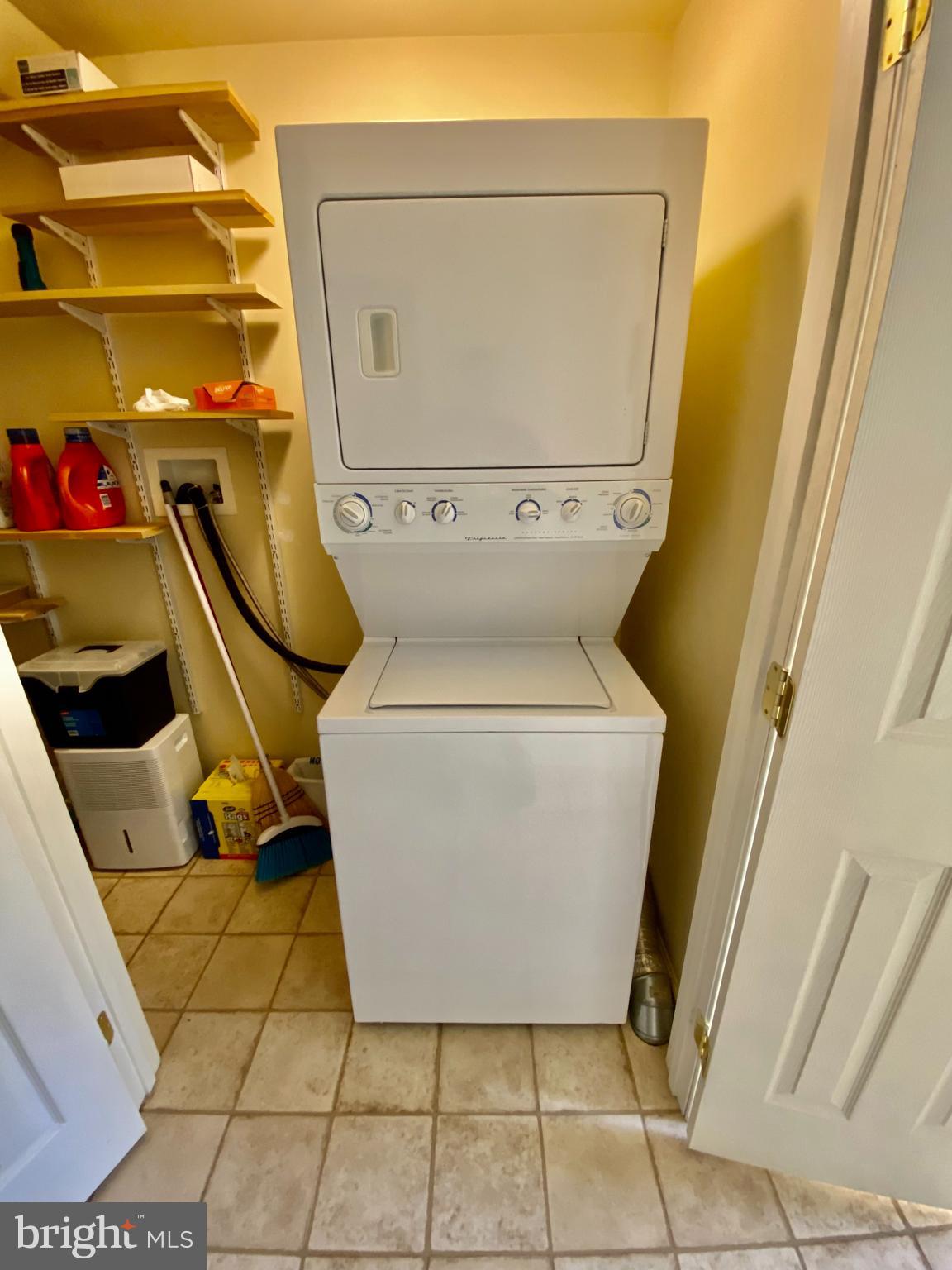 671 Razorback Ridge Road Great Cacapon, WV 25422 - Photo 9 of 35 Large washer/dryer combo.