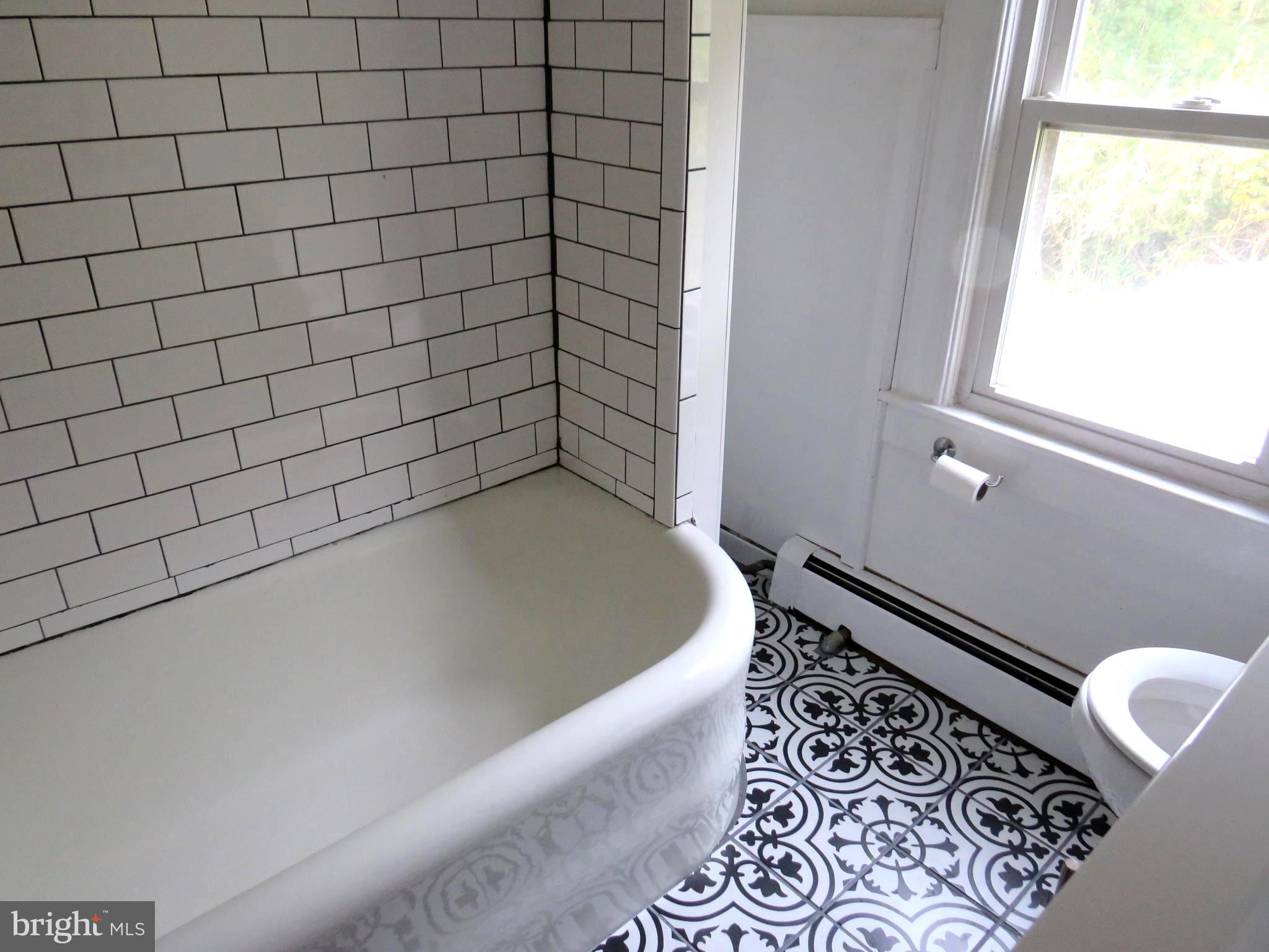 3372 Sackertown Road Crisfield, MD 21817 - Photo 19 of 29 a bathroom with a bathtub