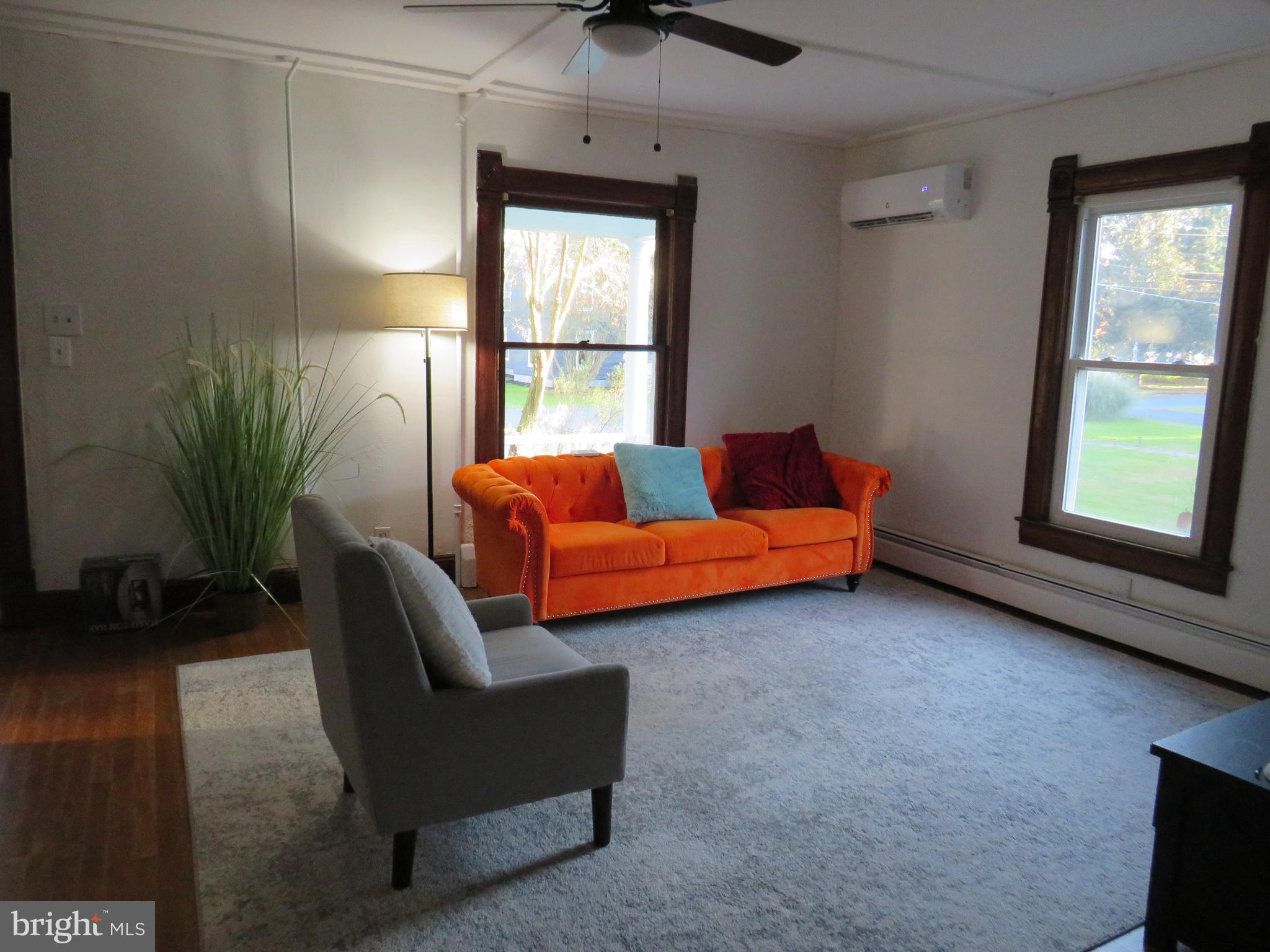 3372 Sackertown Road Crisfield, MD 21817 - Photo 7 of 29 a living room with furniture and a window