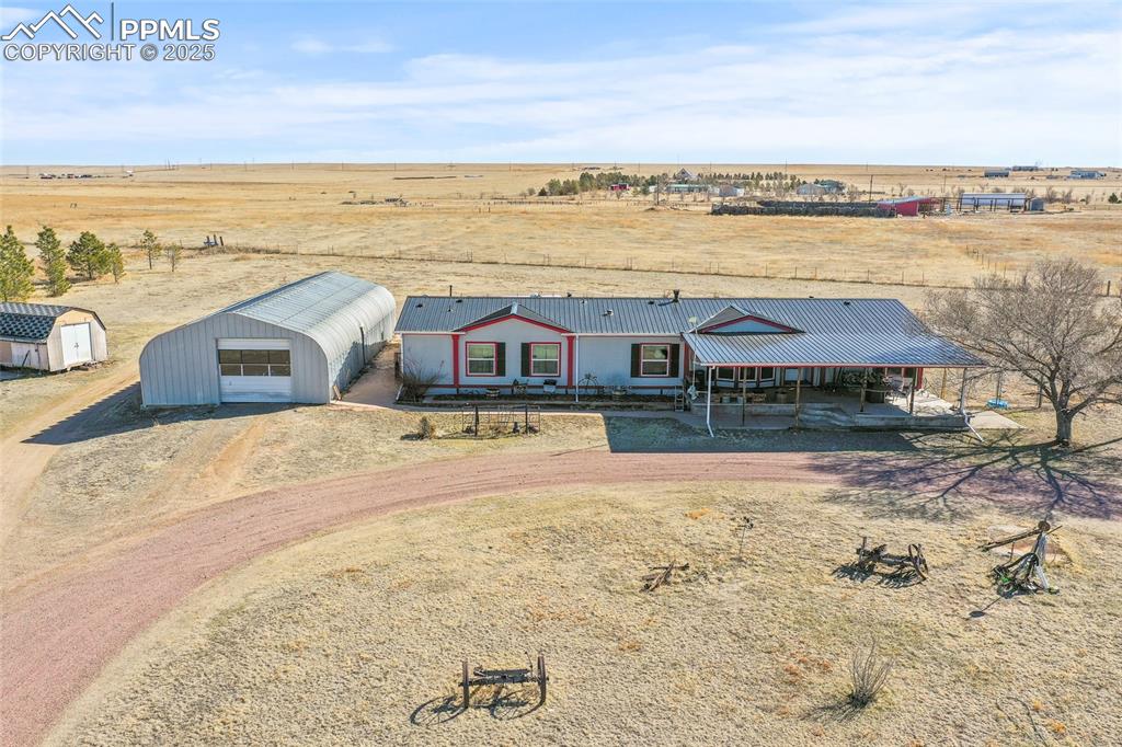 33440 Highway 94 Yoder, CO 80864 - Photo 14 of 30 a view of a lake with a mountain view