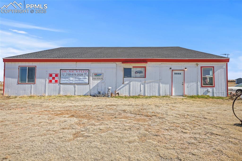 33440 Highway 94 Yoder, CO 80864 - Photo 28 of 30 a front view of a building with retail shops