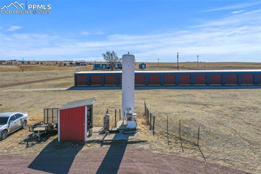 33440 Highway 94 Yoder, CO 80864 - Photo 8 of 30 a view of a terrace with wooden floor and city view