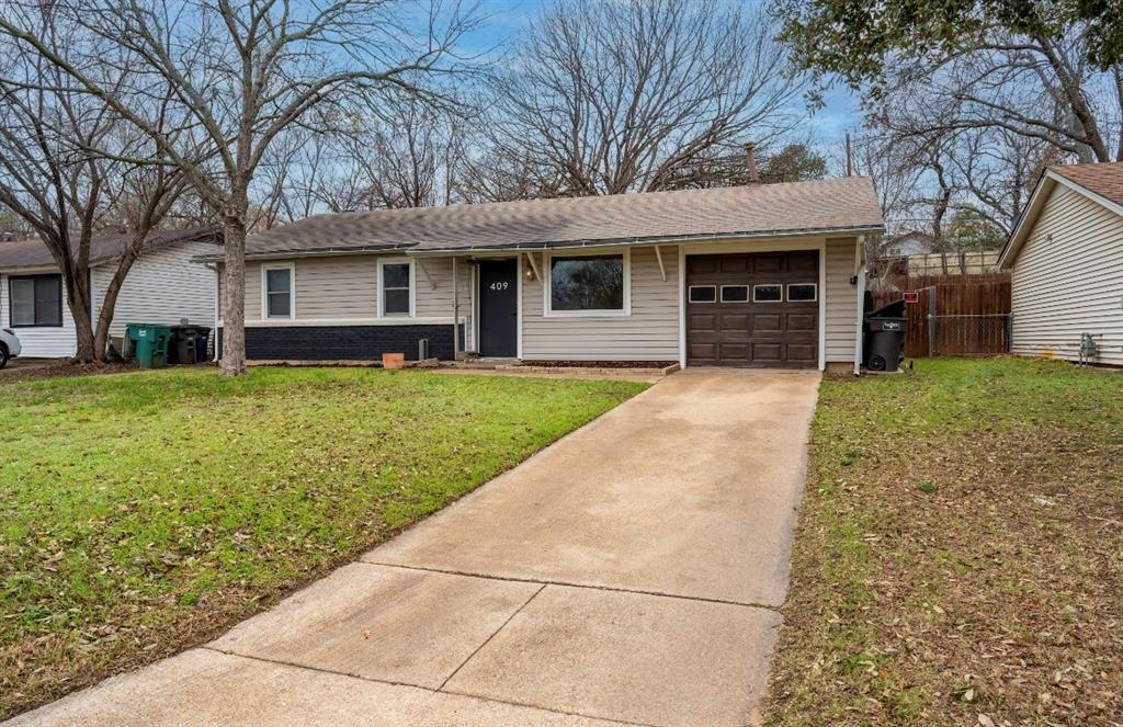 409 Byron Street Fort Worth, TX 76114 - Photo 1 of 1 a view of a yard with a house and a large tree