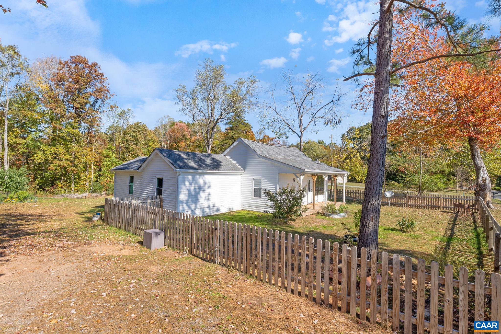 874 James River Road Scottsville, VA 24590 - Photo 33 of 43 a view of a house with a yard