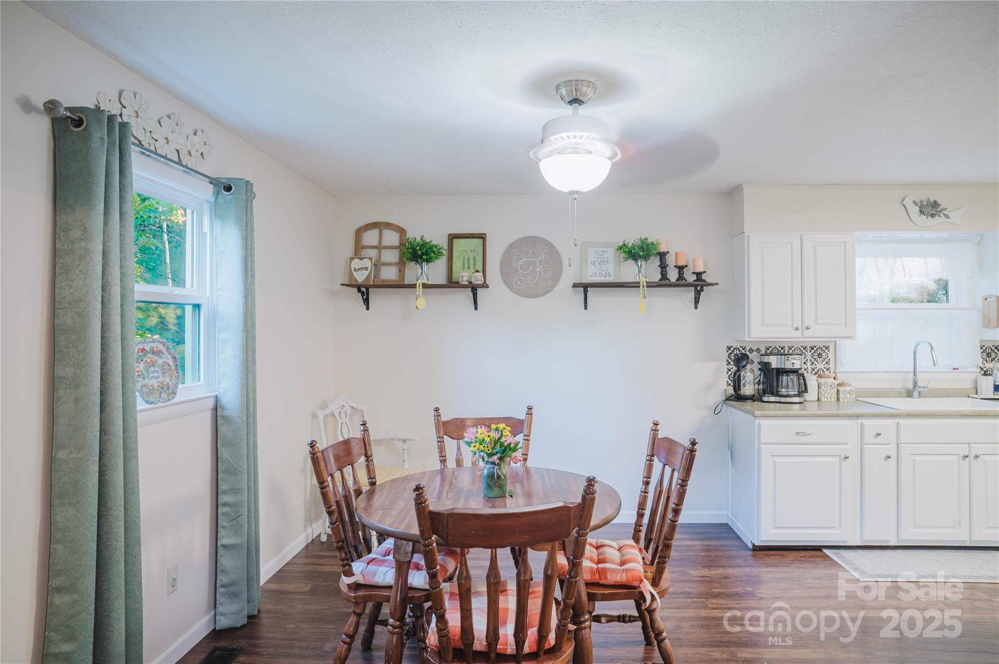 20 Ridgeway Drive Flat Rock, NC 28731 - Photo 17 of 47 a view of a dining room with furniture and wooden floor