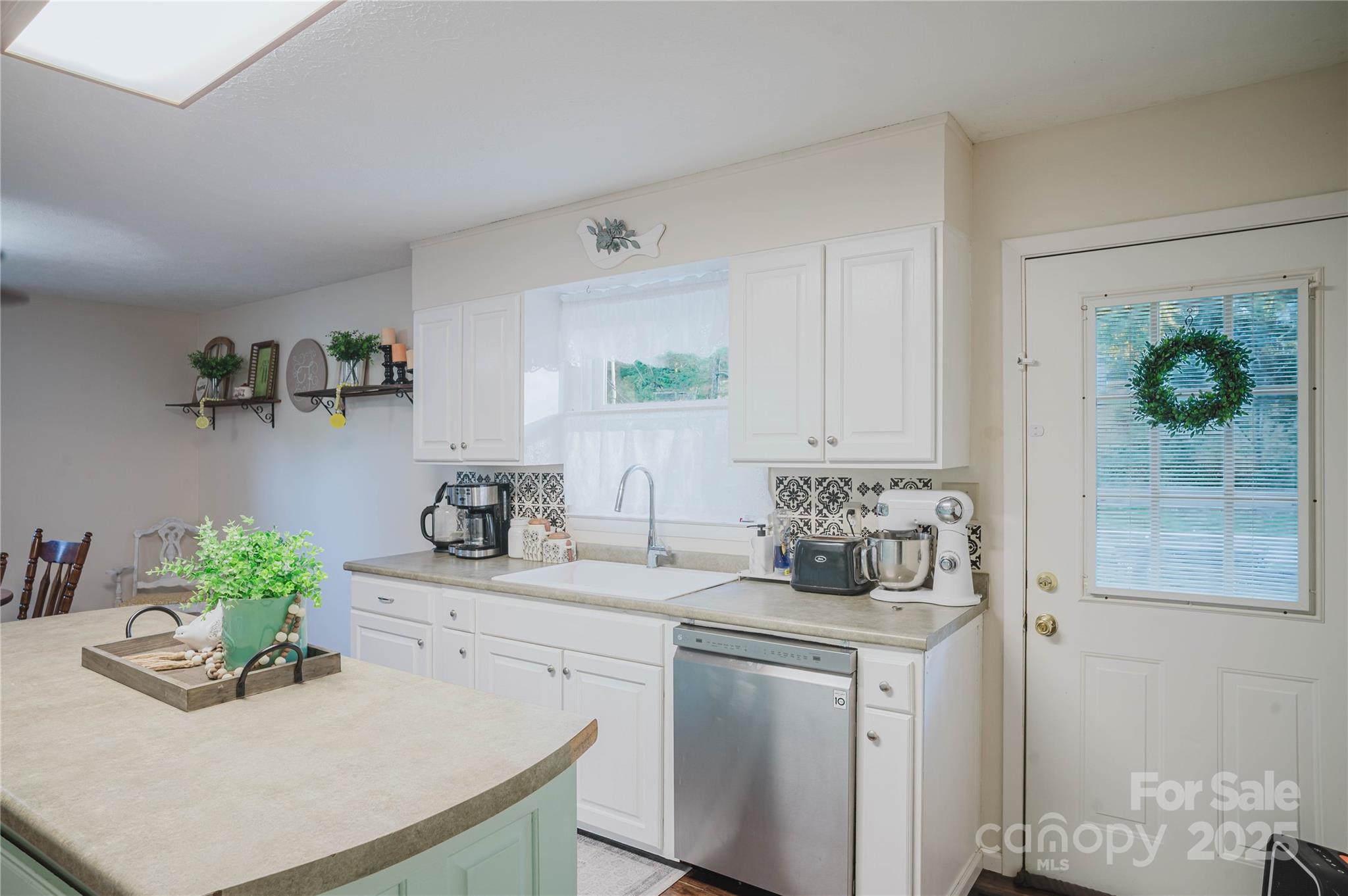 20 Ridgeway Drive Flat Rock, NC 28731 - Photo 20 of 47 a kitchen with sink and cabinets