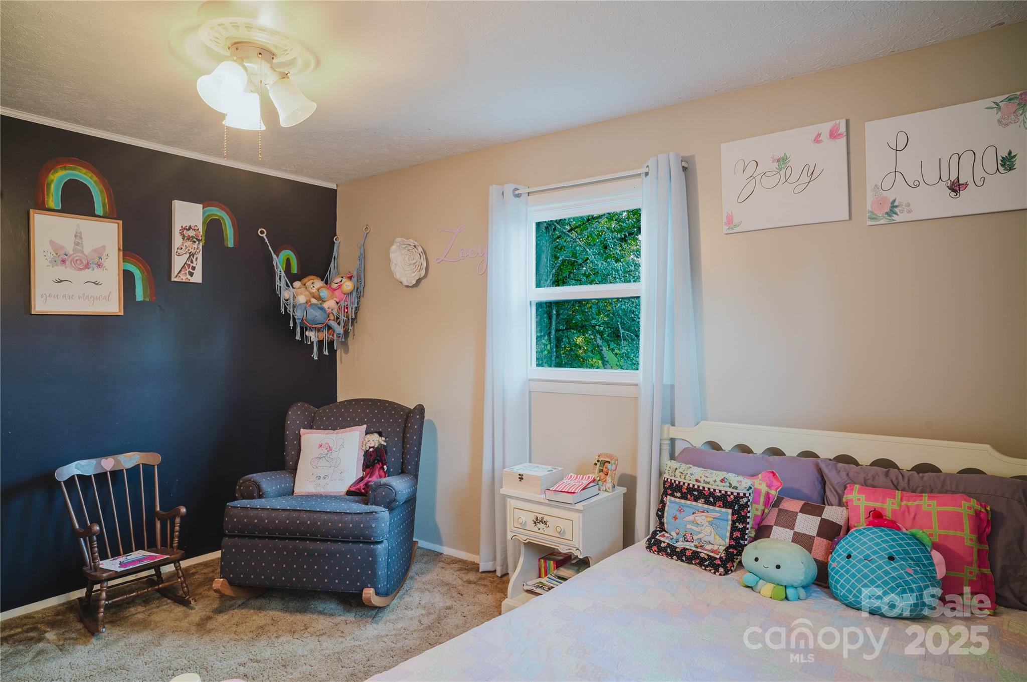 20 Ridgeway Drive Flat Rock, NC 28731 - Photo 31 of 47 a bedroom with furniture and a window