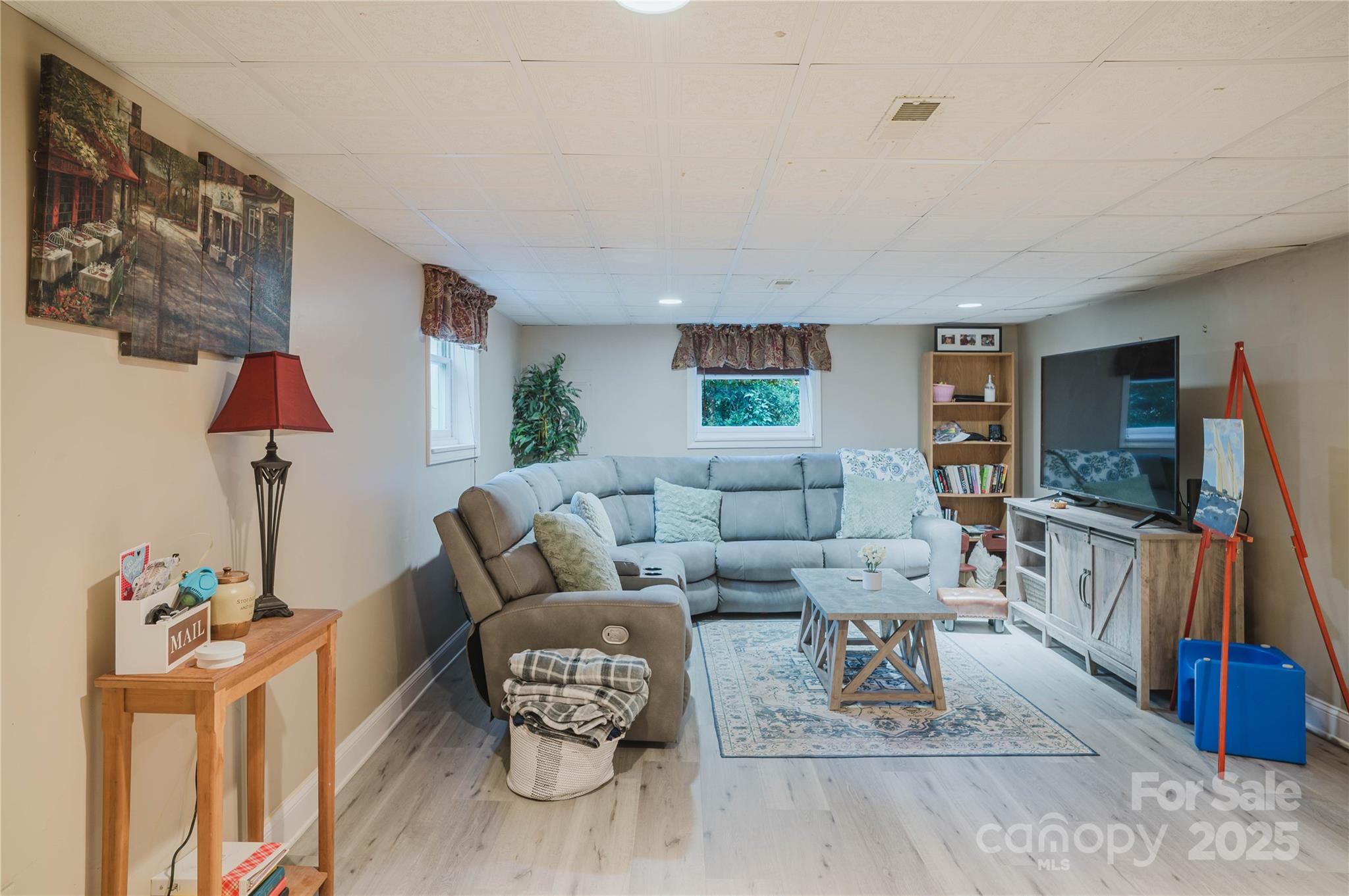 20 Ridgeway Drive Flat Rock, NC 28731 - Photo 38 of 47 a living room with furniture and a flat screen tv