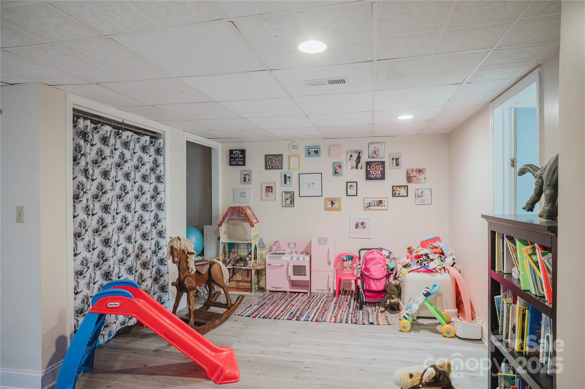 20 Ridgeway Drive Flat Rock, NC 28731 - Photo 42 of 47 a living room with lots of baby toys