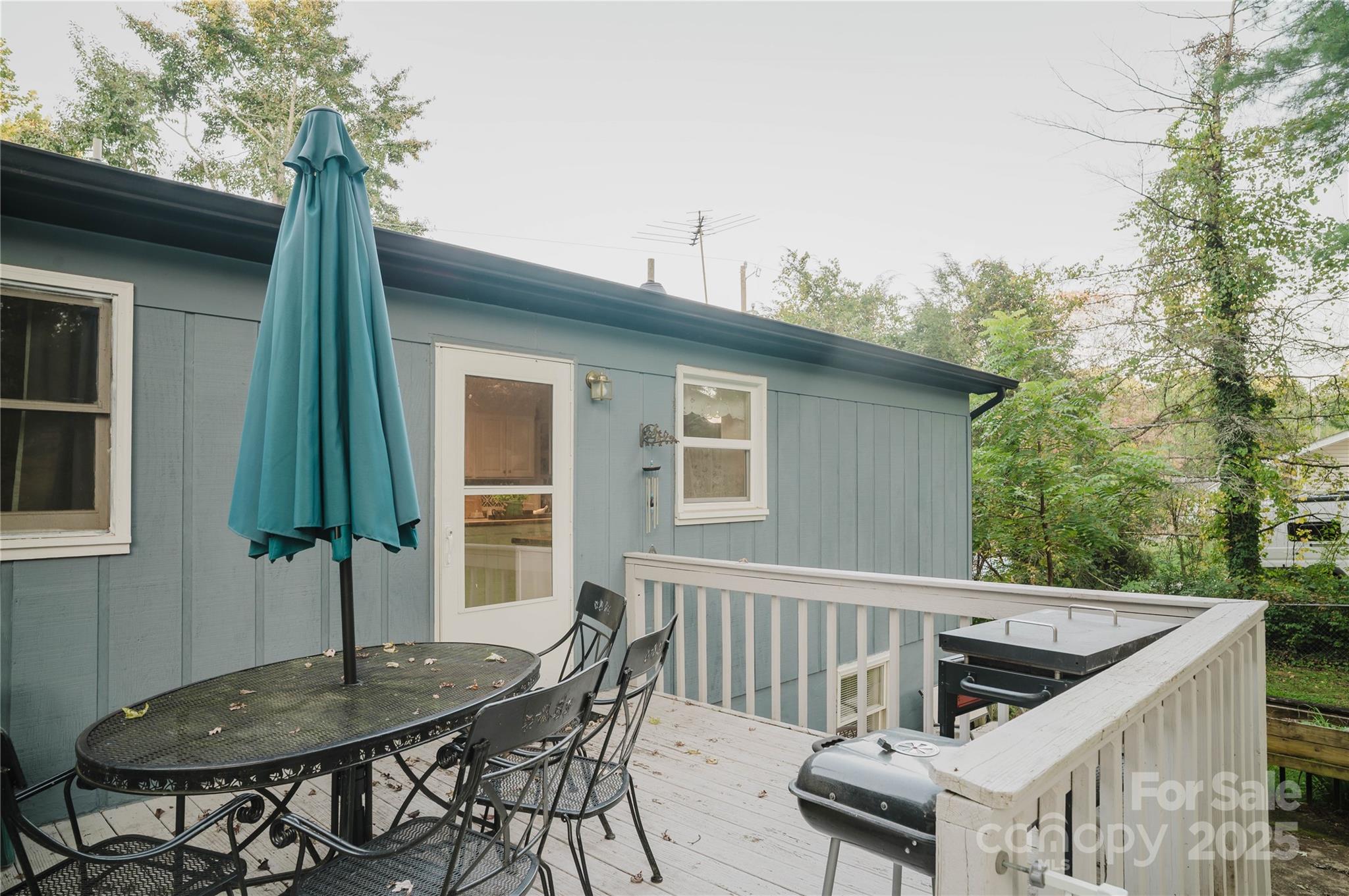 20 Ridgeway Drive Flat Rock, NC 28731 - Photo 46 of 47 a view of backyard with a deck and furniture
