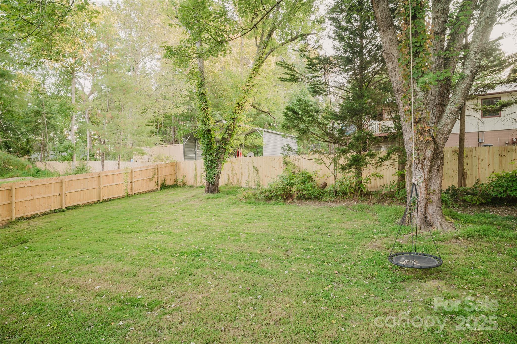20 Ridgeway Drive Flat Rock, NC 28731 - Photo 47 of 47 a view of a backyard with large trees