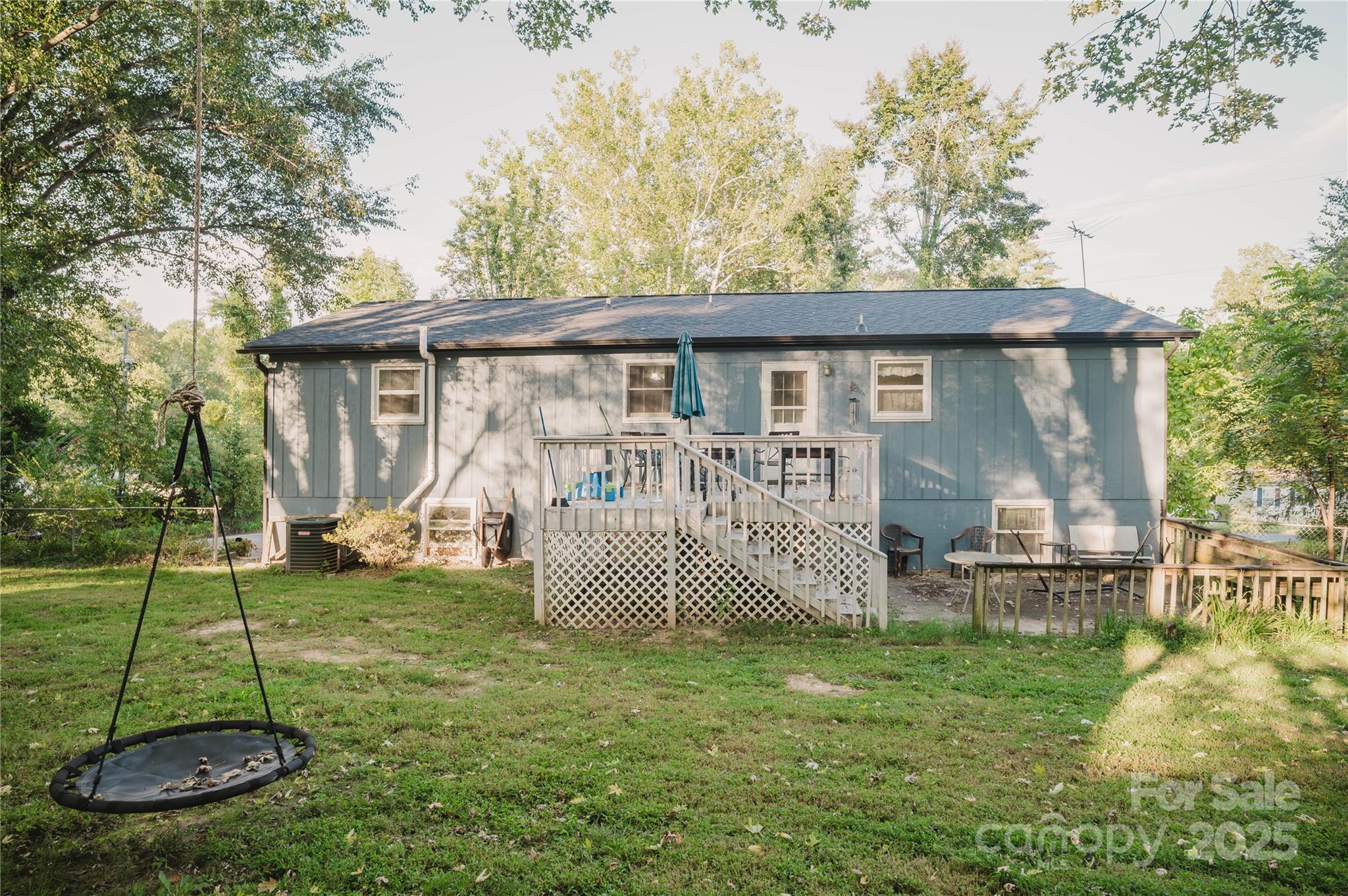 20 Ridgeway Drive Flat Rock, NC 28731 - Photo 9 of 47 a view of a house with a yard and a garden