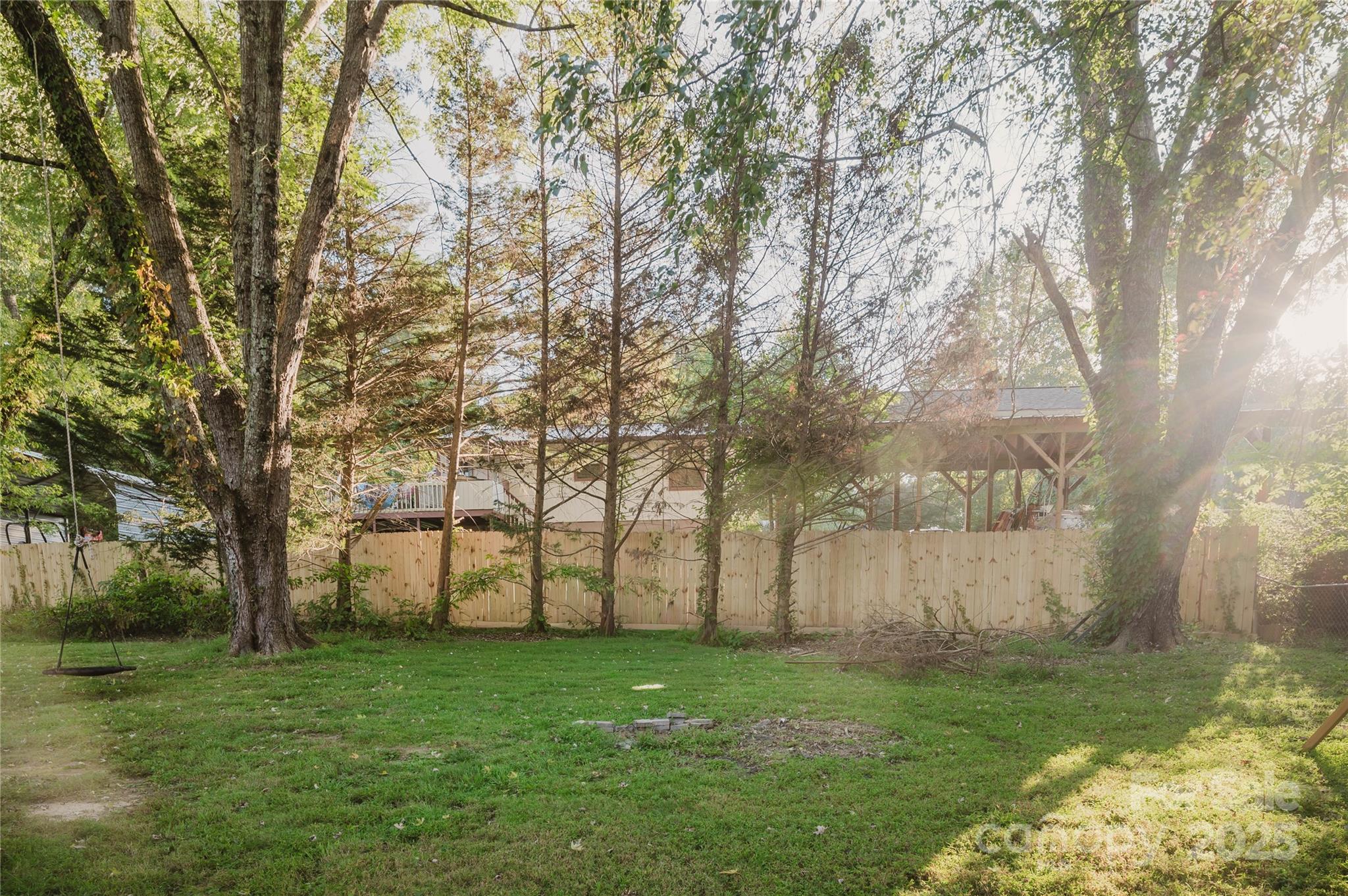 20 Ridgeway Drive Flat Rock, NC 28731 - Photo 10 of 47 a view of backyard with large trees
