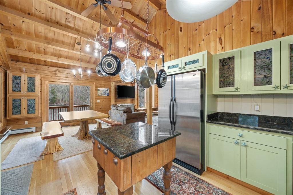 119 Valley Bars Road Bourne, MA 02532 - Photo 8 of 36 a kitchen with stainless steel appliances granite countertop a sink a stove and refrigerator