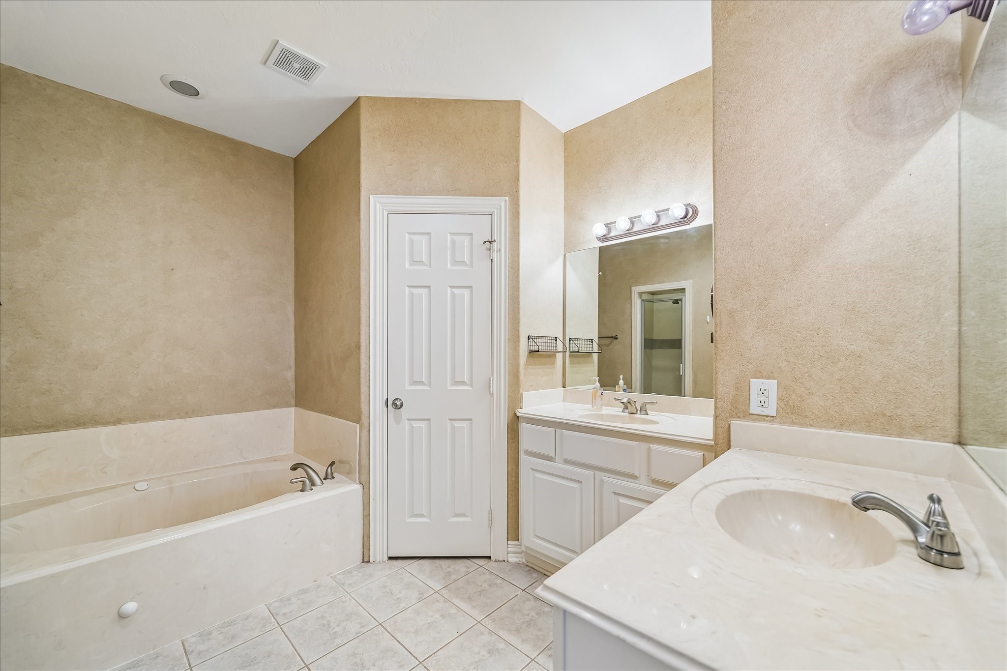 1950 Gentryside Drive Houston, TX 77077 - Photo 15 of 20 Primary bathroom with double sinks