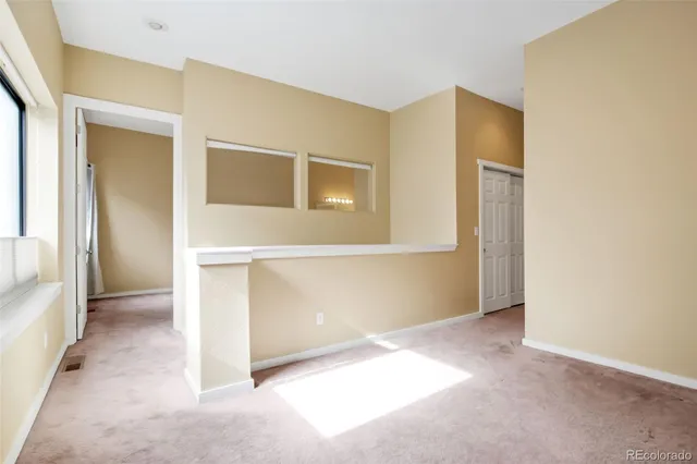 an empty room with windows