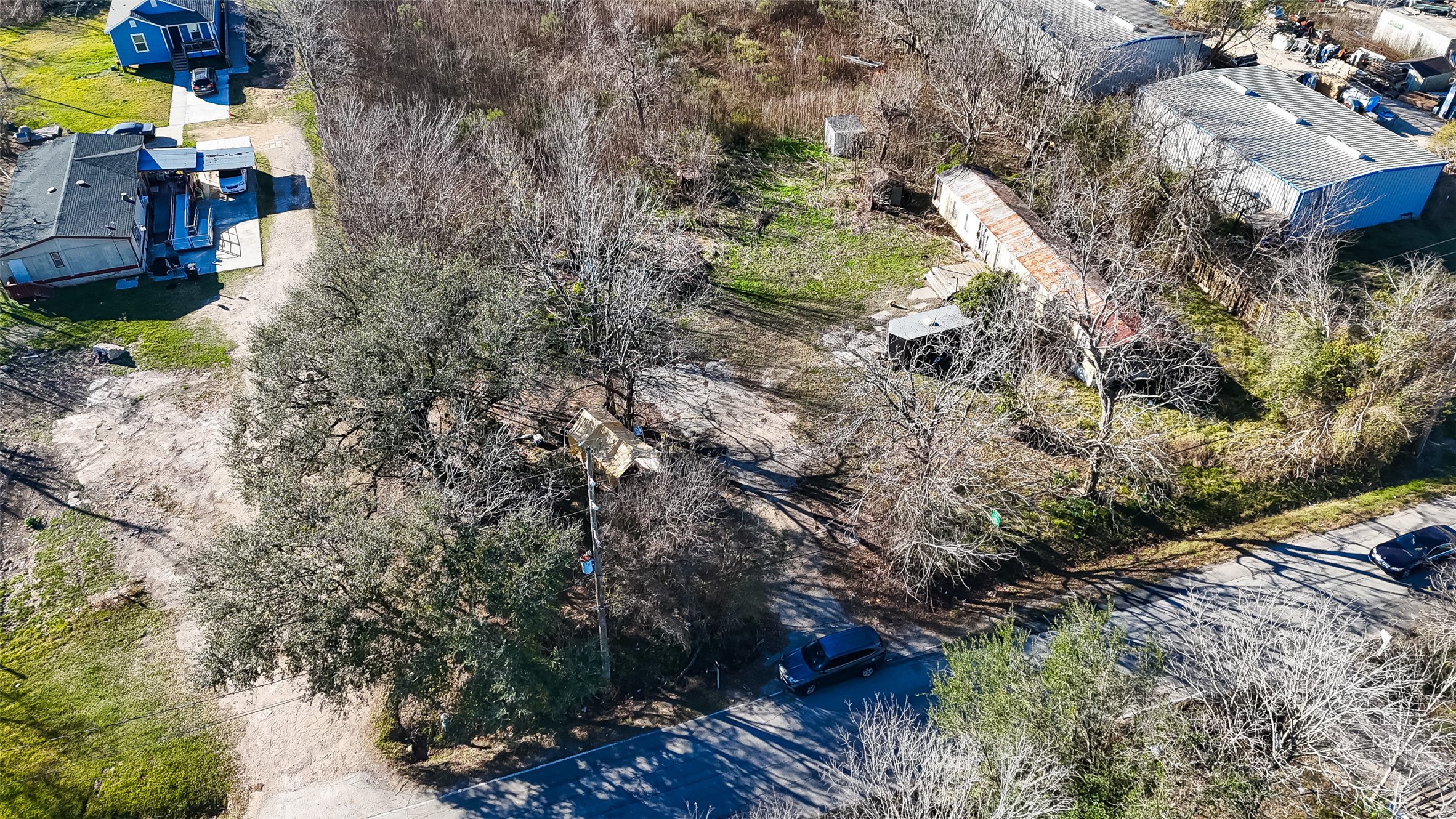 3934 Fuqua Street Houston, TX 77047 - Photo 7 of 43 a backyard of a house with lots of green space