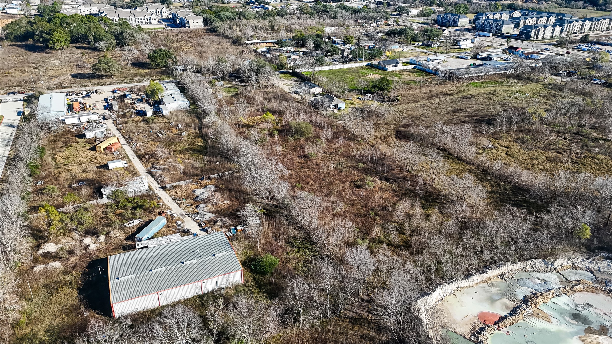 3934 Fuqua Street Houston, TX 77047 - Photo 8 of 43 an aerial view of residential houses with outdoor space