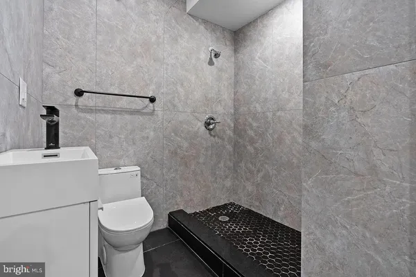a bathroom with a sink and a toilet